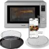 Front view of the sleek stainless steel Panasonic HomeChef 4-in-1 microwave air fryer combo on a modern countertop.