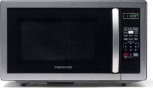 Front view of the Farberware 1.1 cu ft countertop microwave with stainless steel finish and digital LED display.