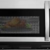 Front view of the stainless steel 1.5 cu.ft. over the range microwave with air fryer installed in a kitchen.