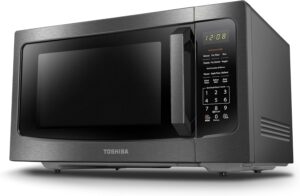 Toshiba 1.6 cu. ft. large countertop microwave featuring a sleek black stainless steel finish in a modern kitchen.