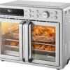 Front view of the Midea Flexify 26.4qt French door air fryer toaster oven with open anti-scald doors.
