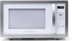 Front view of the Farberware 1.1 cu ft countertop microwave in a sleek white platinum finish.