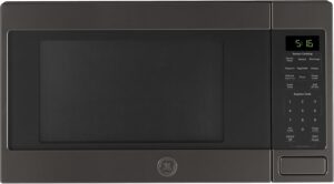 Front view of the sleek black stainless steel GE countertop microwave with digital control panel