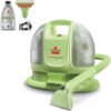 The Bissell Little Green portable carpet cleaner effectively removing a pet stain from an area rug.