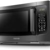 Front view of the Toshiba 1200W large countertop microwave with its bright LED digital display and control panel.