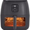Close-up of the built-in viewing window on the Dash air fryer with internal light illuminating the basket.