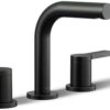 Close-up of matte black widespread bathroom faucet showing the elegant two-handle design