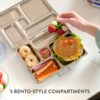 Close up of the kid-friendly latch on the PlanetBox Rover stainless steel bento box