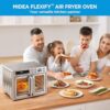 Interior view of the spacious 26.4 QT French door air fryer toaster oven holding a 12-inch pizza.
