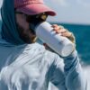 YETI Rambler 16 oz Travel Bottle, Stainless Steel, Vacuum Insulated with Leakproof Commuter Cap, Olive/King Crab Orange