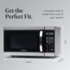 A Farberware 1.1 cu ft countertop microwave placed on a modern kitchen counter.