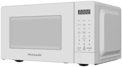 Interior view of the 0.7 cu. ft. white microwave featuring a removable glass turntable for easy cleaning.