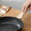 Close-up of the 10-inch granite frying pan surface demonstrating its low-oil and easy-clean nonstick texture.