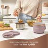 Side view of the blush pink food warmer showing the compact design for office or travel use.