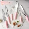 In-use perspective of the sharp stainless steel blades slicing vegetables for meal preparation.