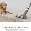 The Dyson V15 Detect cordless vacuum converted into a handheld mode for cleaning car interiors.