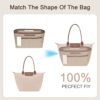 A zippered pocket inside the ZTUJO felt purse organizer insert for storing valuables securely.