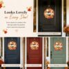 Flat lay of the lightweight Hello Fall harvest wreath against a neutral background