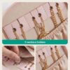 Versatile travel jewelry case holding earrings, rings, and daily essentials like lipstick