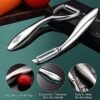 Durable dishwasher-safe stainless steel vegetable peeler resting on a clean kitchen counter