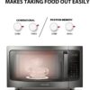 The Toshiba 1.6 cu. ft. microwave showcasing its stylish black stainless-steel design on a clean kitchen countertop.