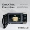 Side profile of the compact Farberware 1000-watt microwave designed for home or office use.