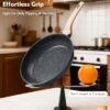 A lightweight 10-inch granite frying pan displayed on a kitchen rack by its integrated handle storage loop.