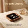 Lifestyle setting featuring the walnut wood ring holder tray holding various jewelry pieces.