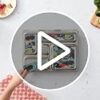 PlanetBox Rover stainless steel bento box displayed in a carry bag for kids ages 3 and up