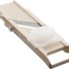 Top down view of the Benriner Japanese mandoline slicer set with safety finger guard and blades