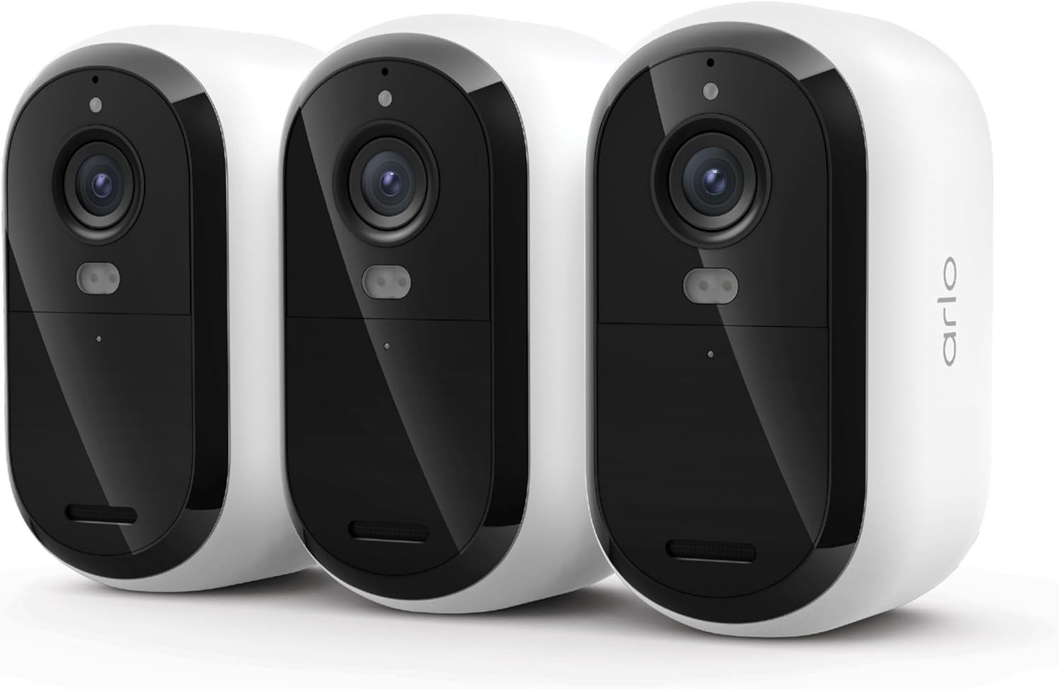 Three white Arlo Essential 2K wireless outdoor security cameras arranged for a complete home monitoring system.