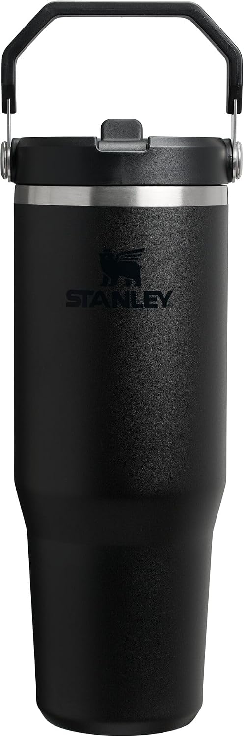 Stanley IceFlow flip straw tumbler in black 30oz profile view showing the easy-carry handle.