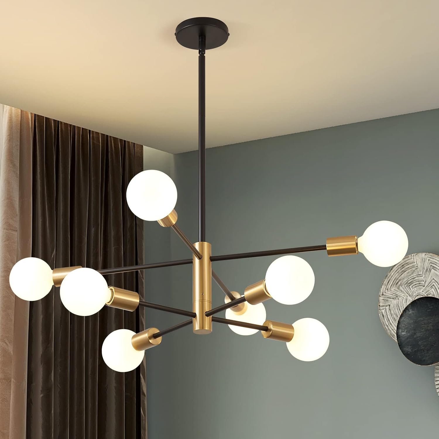 Modern sputnik chandelier featuring an 8-light design in sleek black and gold finishes.