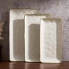 Famiware set of three vanilla white stoneware serving platters in varying sizes