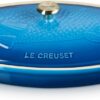 Le Creuset stoneware fish baker in Marseille blue with elegant embossed lid design