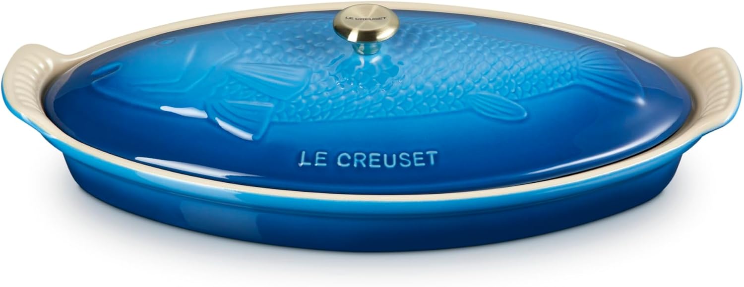 Le Creuset stoneware fish baker in Marseille blue with elegant embossed lid design