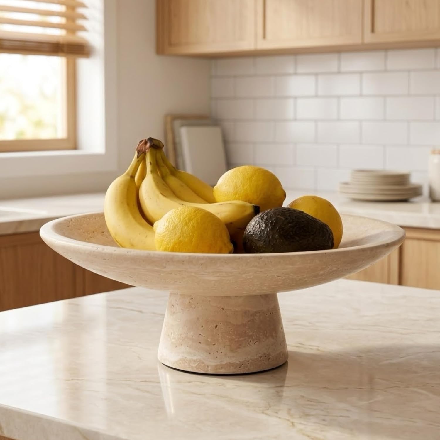 BekPooQ travertine fruit bowl on a modern kitchen counter