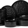 Full 12-piece E-far matte black stoneware dinnerware set arranged neatly for four, including plates and bowls.