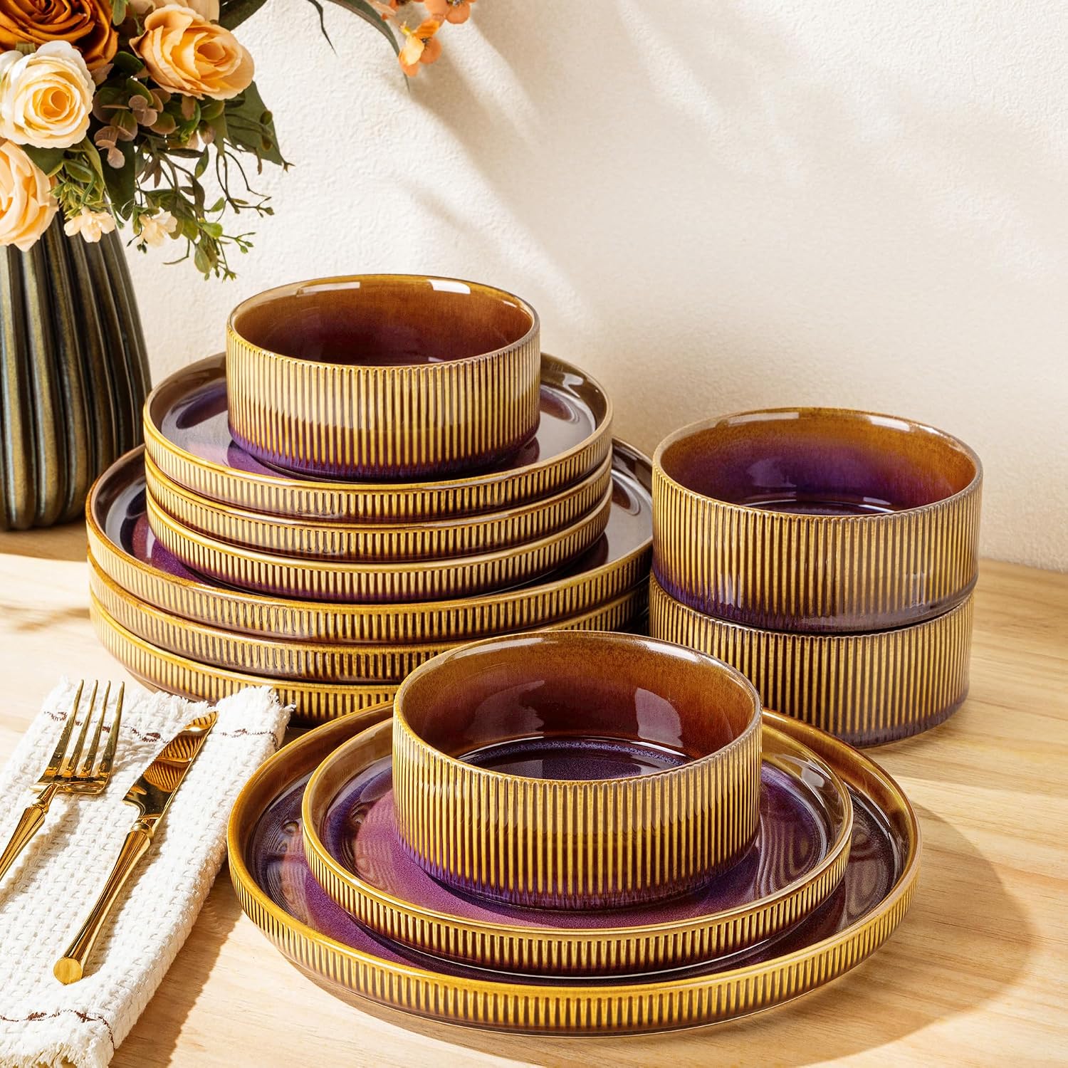 TheTerra handcrafted 12-piece ceramic dinnerware set for 4 featuring unique reactive glaze finishes.
