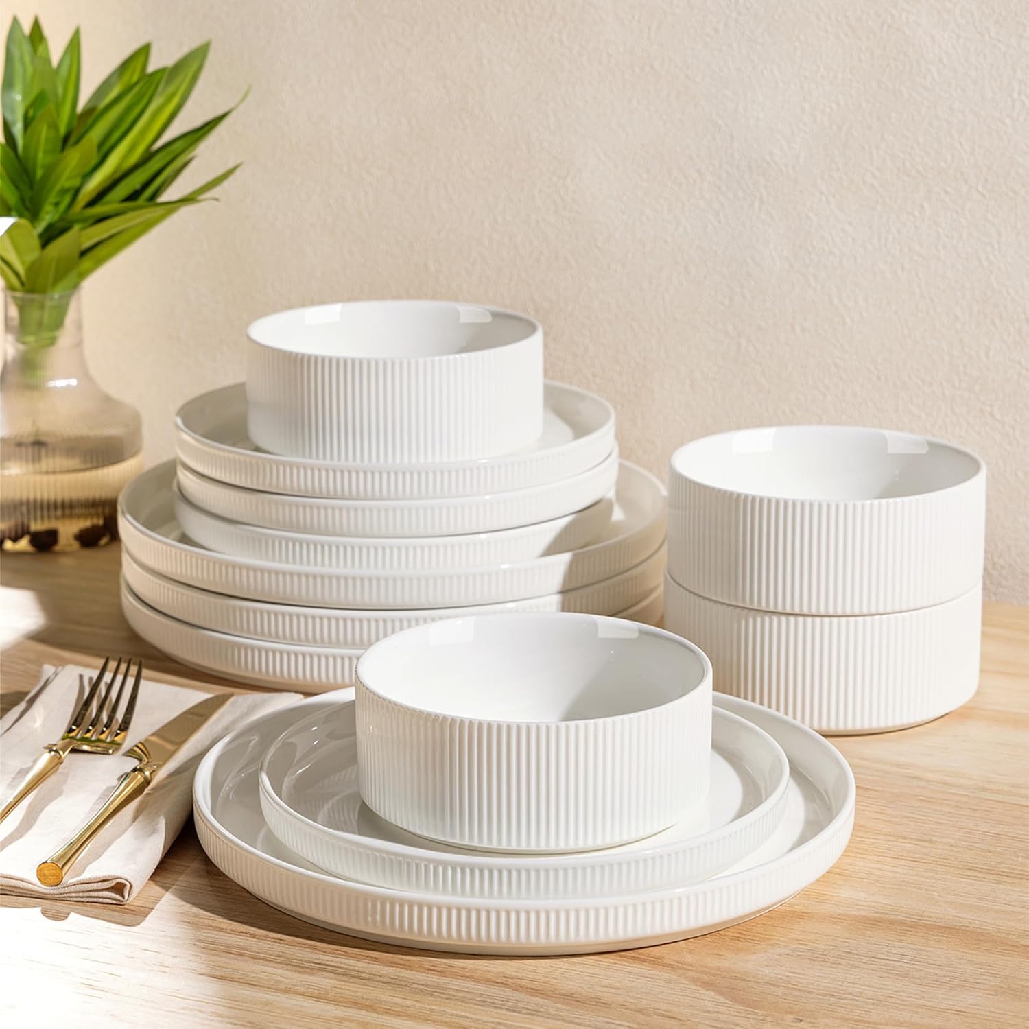 TheTerra 12-piece ceramic dinnerware set for 4 displayed in a modern, elegant table arrangement.
