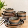 Close-up detail of the artisan handcrafted ceramic dinnerware set for 4 showing the rich double reactive glaze texture.