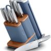 Close-up of the NeverDull integrated ceramic sharpening wheel engaging a blade for precision results.