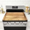 Close up of the durable acacia wood grain on the Gashell noodle board stove cover