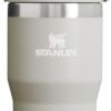Close-up of the Stanley IceFlow tumbler with straw showing the leak-resistant flip-up mechanism.