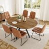 Modern extendable round dining set with hidden center leaf expanded to an oval shape for six people