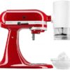 Close-up detail of the KitchenAid shave ice attachment mechanism for fine or coarse texture control.