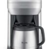 Close up view of the Breville Grind Control integrated coffee grinder with adjustable settings for bean freshness.