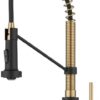 Front view of the Kraus Bolden brushed brass kitchen faucet in a modern kitchen