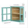 Two-tier interior storage of the bamboo corner bread box holding assorted sourdough loaves and bagels.