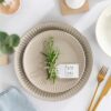 Close up of the refined ribbed texture and muted tones on the Pure Living stoneware plate.
